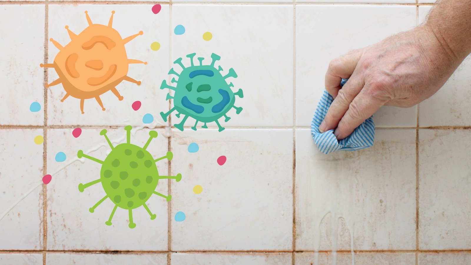 main qui nettoye des joints de carrelage virus colorés sur le carrelage